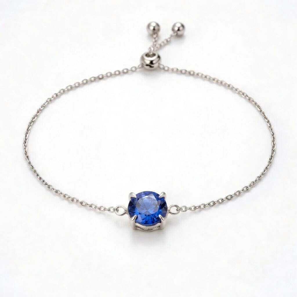 tanzanite birthstone bracelet in white gold finish — front view