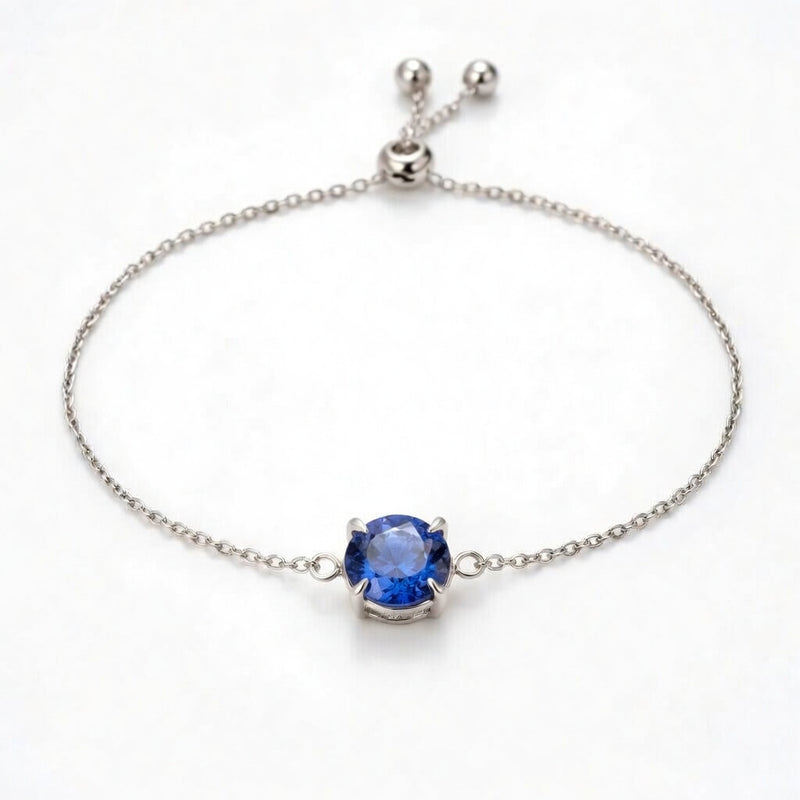 tanzanite birthstone bracelet in white gold finish — front view
