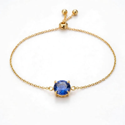tanzanite birthstone bracelet in yellow gold finish — front view