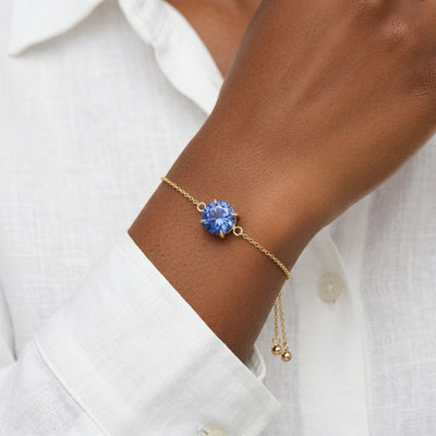 tanzanite birthstone bracelet in yellow gold finish — model view