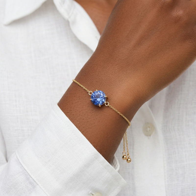 tanzanite birthstone bracelet in yellow gold finish — model view