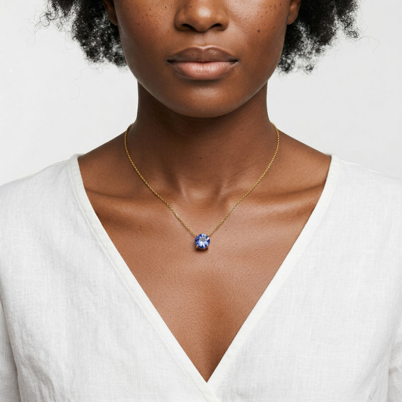 tanzanite birthstone necklace in yellow gold finish — model view
