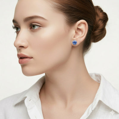 tanzanite birthstone stud earrings in white gold finish — model view