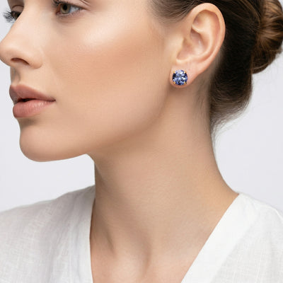 tanzanite birthstone stud earrings in yellow gold finish — model view