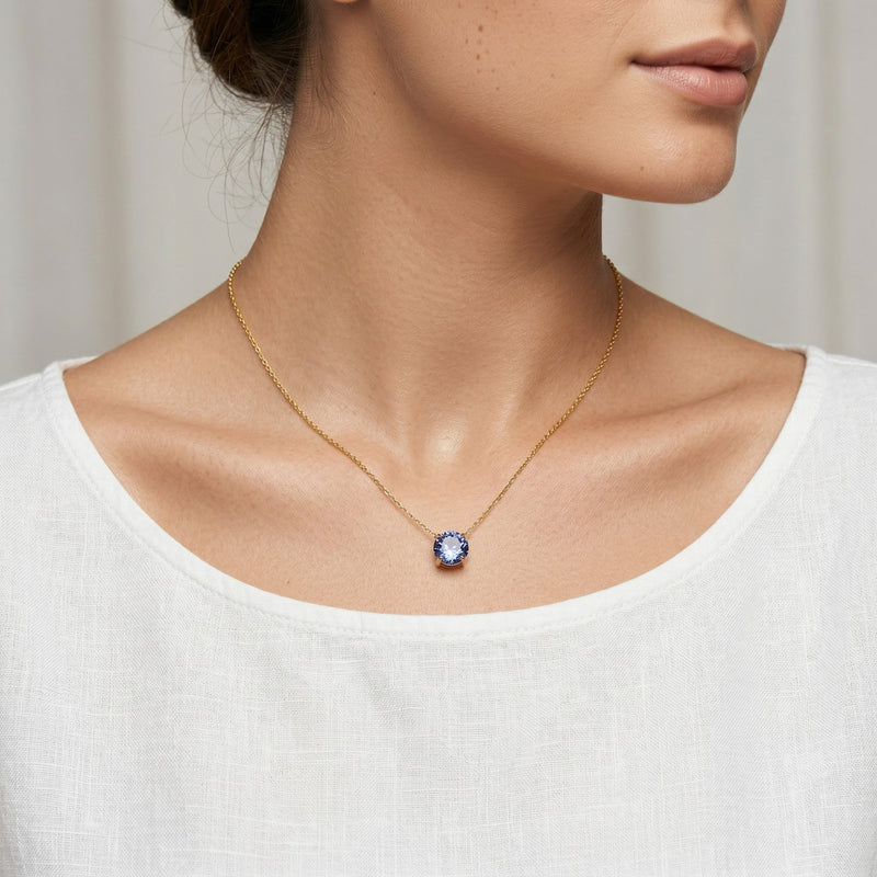 tanzanite birthstone necklace in yellow gold finish — model view