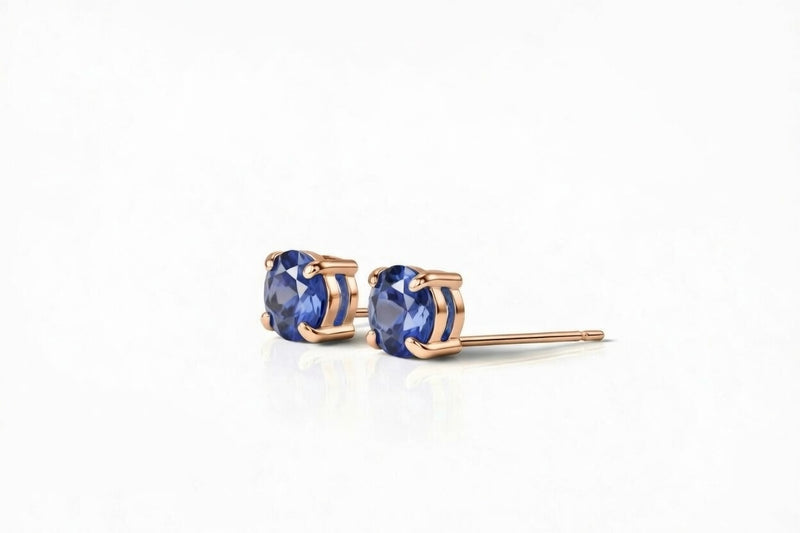 tanzanite birthstone stud earrings in rose gold finish — side view