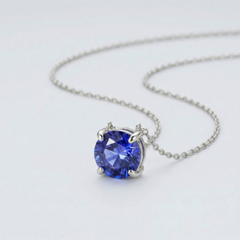 tanzanite birthstone necklace in white gold finish — side view