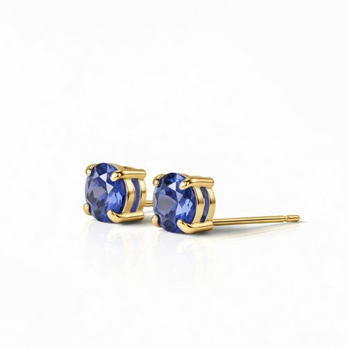 tanzanite birthstone stud earrings in yellow gold finish — side view