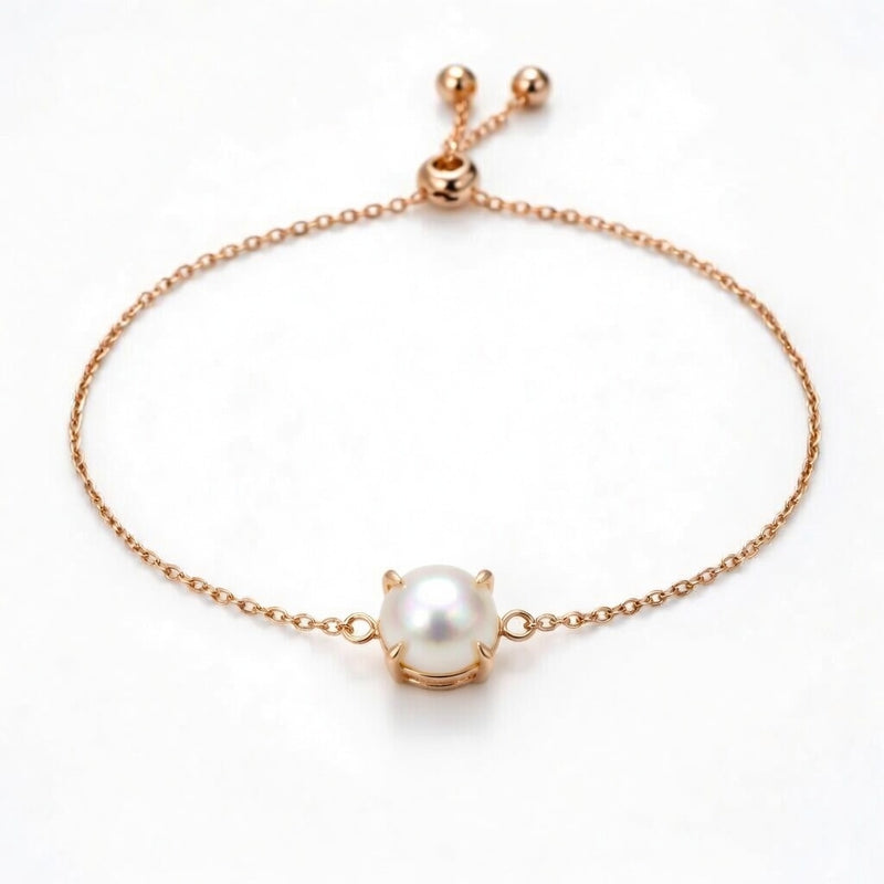 pearl birthstone bracelet in rose gold finish — front view