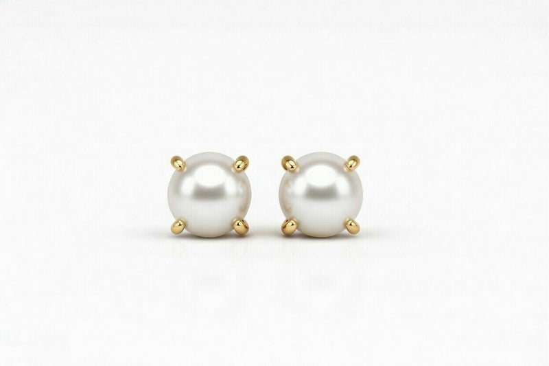 pearl birthstone stud earrings in yellow gold finish — front view