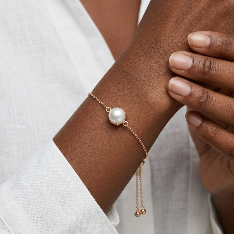pearl birthstone bracelet in rose gold finish — model view