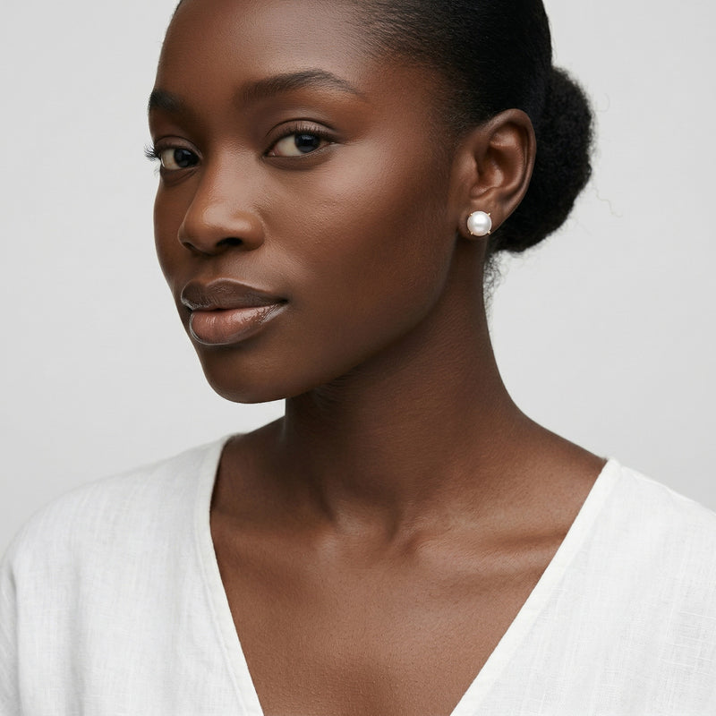 pearl birthstone stud earrings in white gold finish — model view