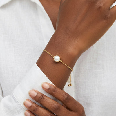 pearl birthstone bracelet in yellow gold finish — model view