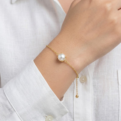 pearl birthstone bracelet in yellow gold finish — model view