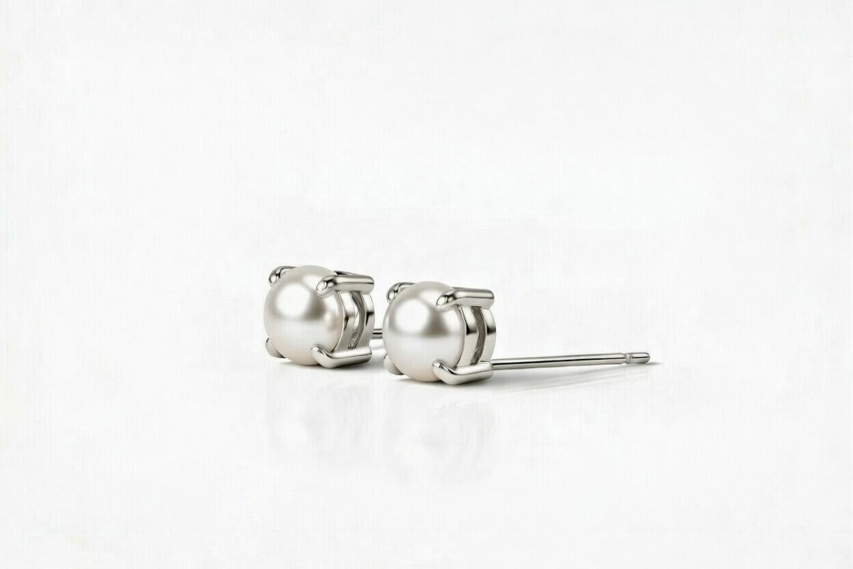 pearl birthstone stud earrings in white gold finish — side view