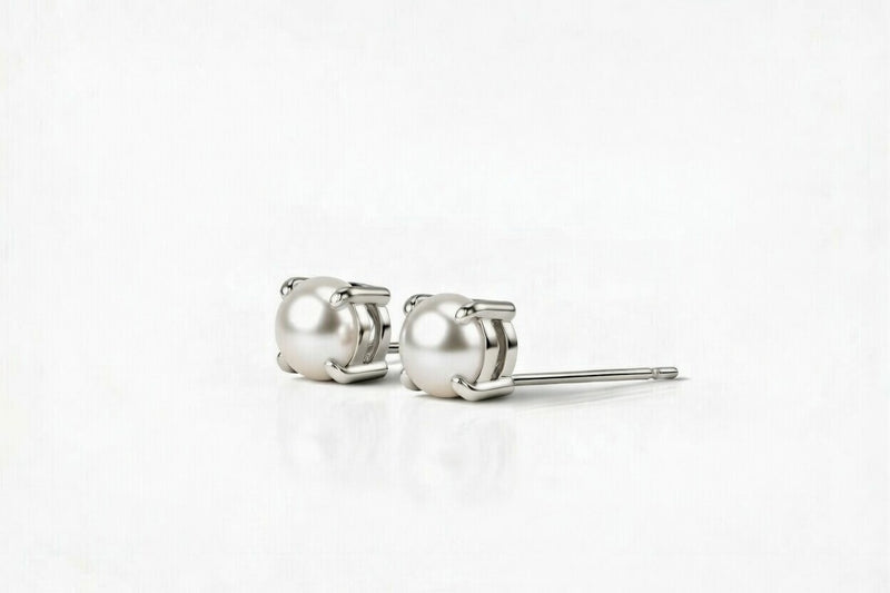 pearl birthstone stud earrings in white gold finish — side view