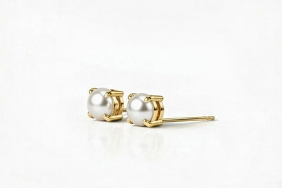 pearl birthstone stud earrings in yellow gold finish — side view