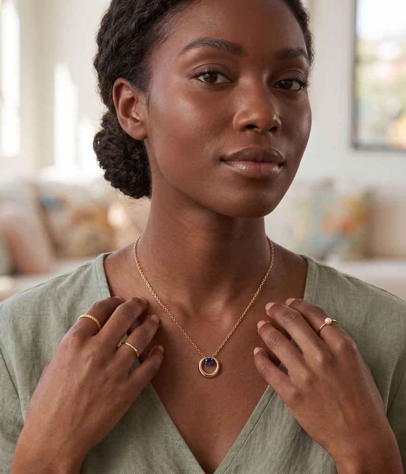 blue sapphire twisted circle pendant necklace in yellow gold finish — model view