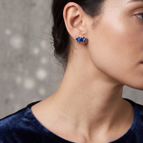 blue sapphire geometric stud earrings in white gold finish — model view