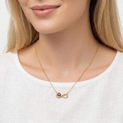 garnet birthstone necklace in yellow gold finish — model view