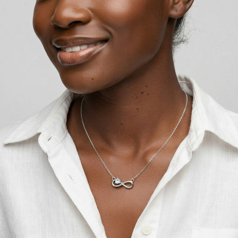 aquamarine birthstone necklace in white gold finish — model view