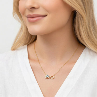 aquamarine birthstone necklace in yellow gold finish — model view