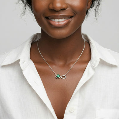 emerald birthstone necklace in white gold finish — model view