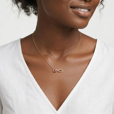 ruby birthstone necklace in yellow gold finish — model view