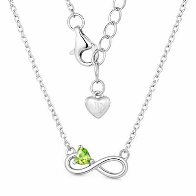 peridot birthstone necklace in white gold finish — back view
