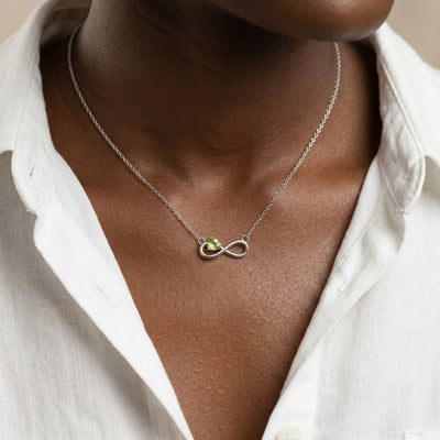 peridot birthstone necklace in white gold finish — model view