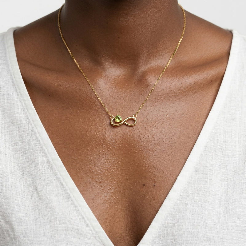 peridot birthstone necklace in yellow gold finish — model view