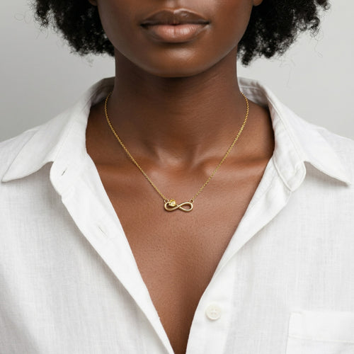 citrine birthstone necklace in yellow gold finish — model view