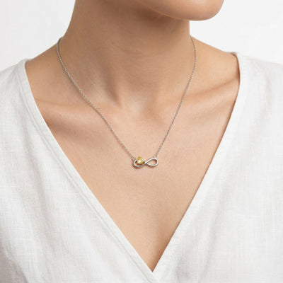 citrine birthstone necklace in white gold finish — model view