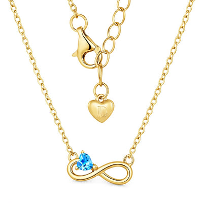 blue topaz birthstone necklace in yellow gold finish — back view