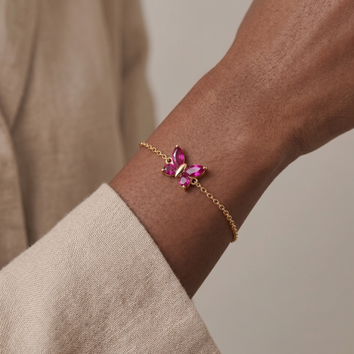 red ruby butterfly bracelet in yellow gold finish — model view