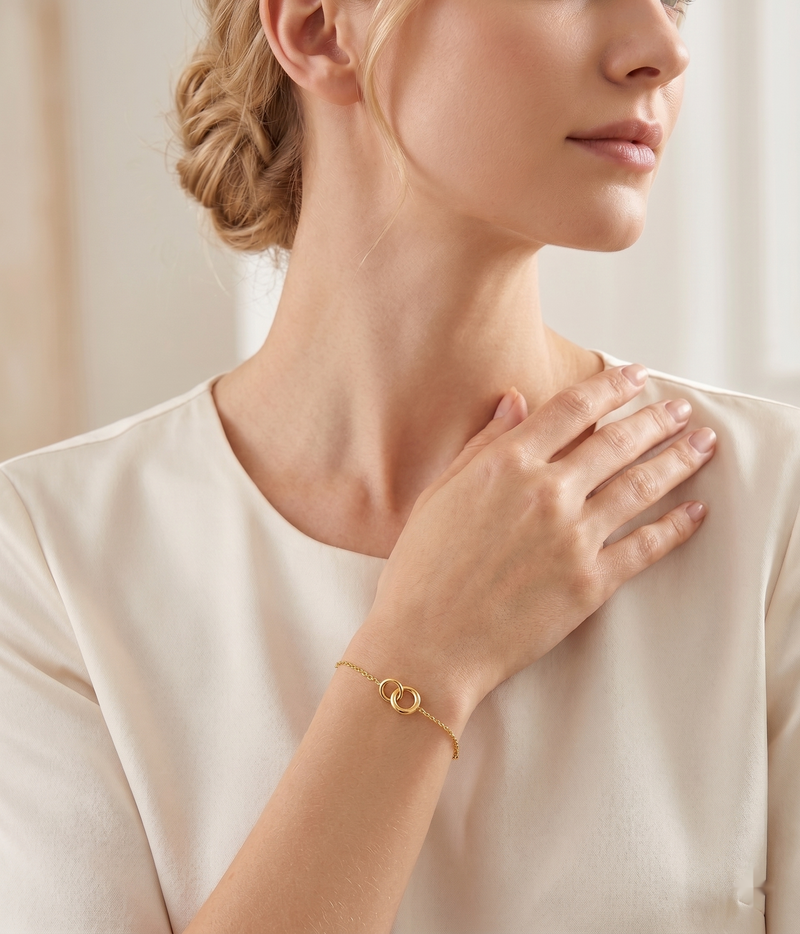 interlocking circles bracelet in yellow gold finish — model view